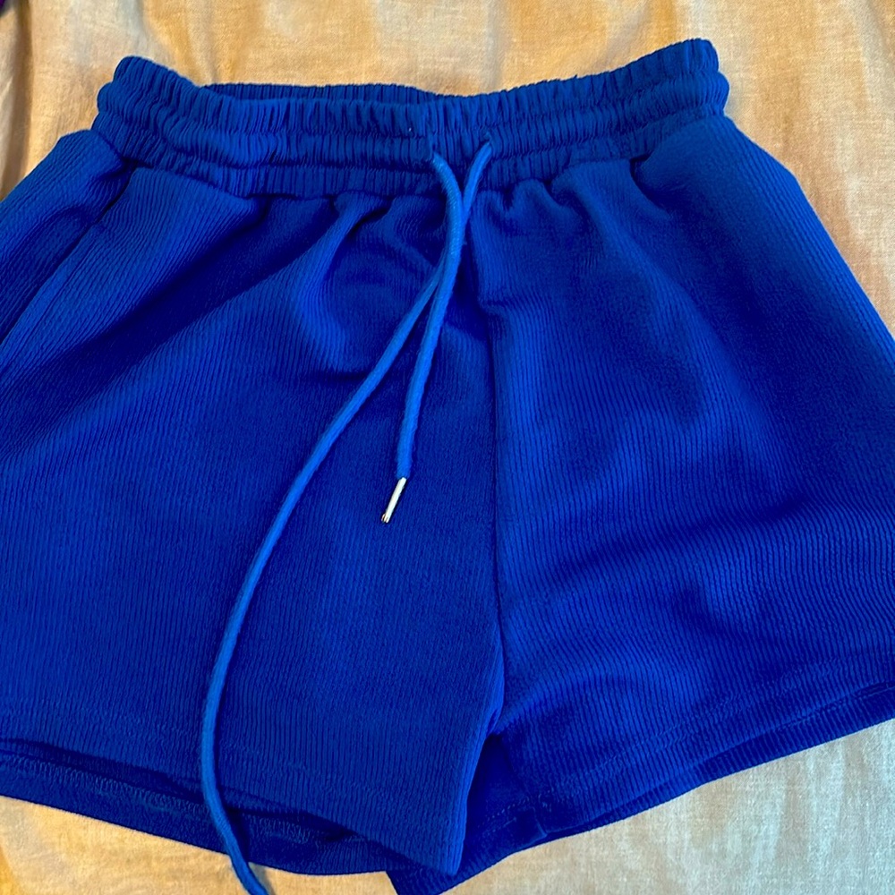 high waisted, royal blue shorts